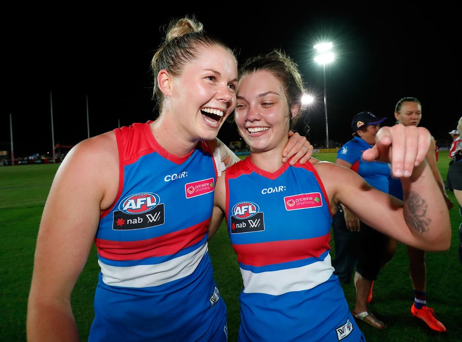 AFLW 2017 Rd 01 - Western Bulldogs v Fremantle MELBOURNE, AUSTRALIA - FEBRUARY 4: Katie Brennan of the Bulldogs (left) celebrates with Ellie Blackburn of the Bulldogs during the 2017 AFLW Round 01 match between the Western Bulldogs and the Fremantle Dockers at VU Whitten Oval on February 4, 2017 in Melbourne, Australia. (Photo by Adam Trafford/AFL Media)
